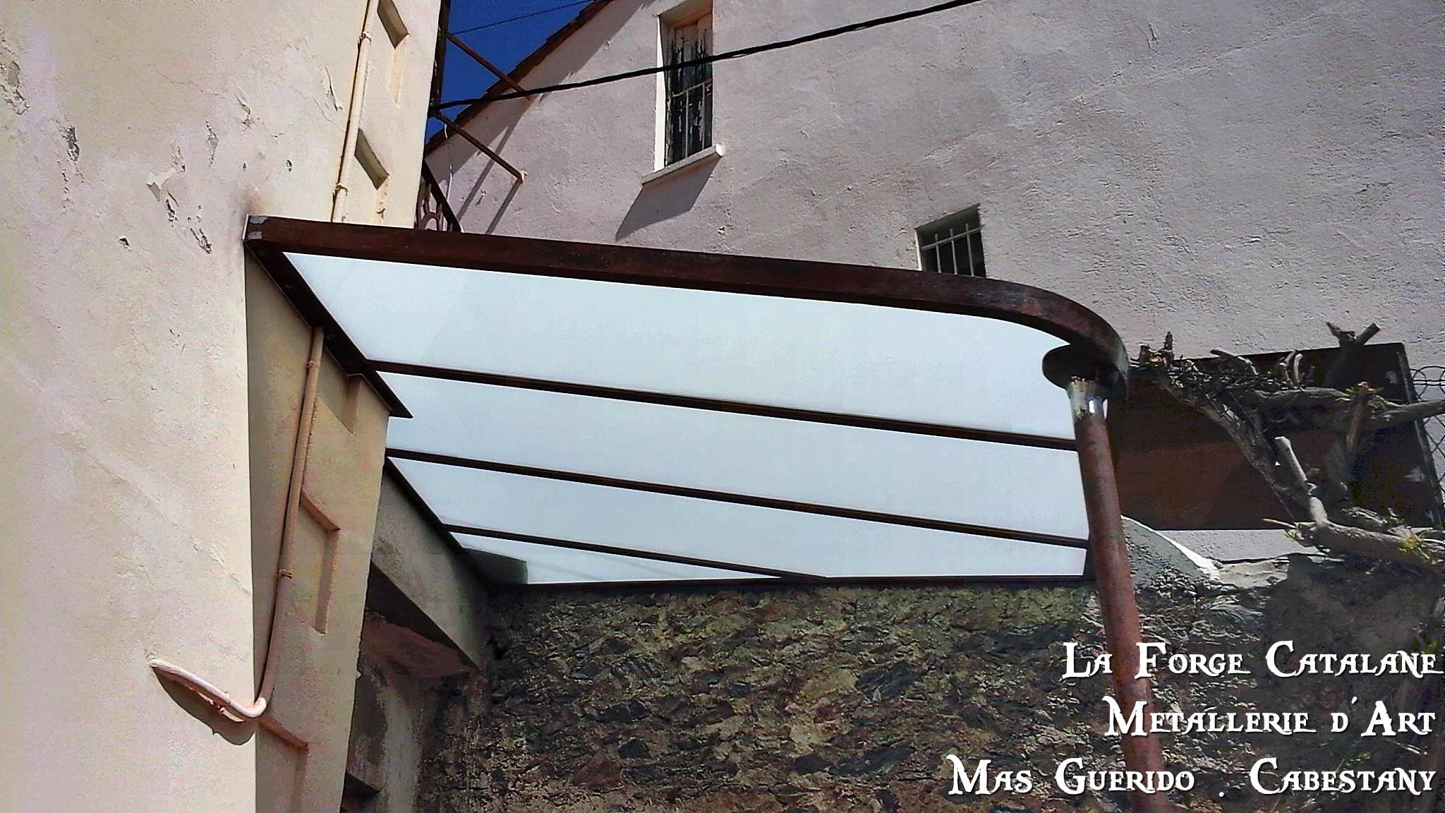 Marquise fer vitrage opalescent Forge Catalane.jpg